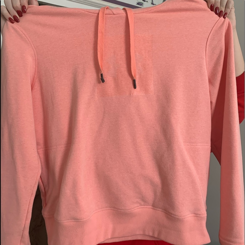 Light pink Under Armour sweatshirt with logo